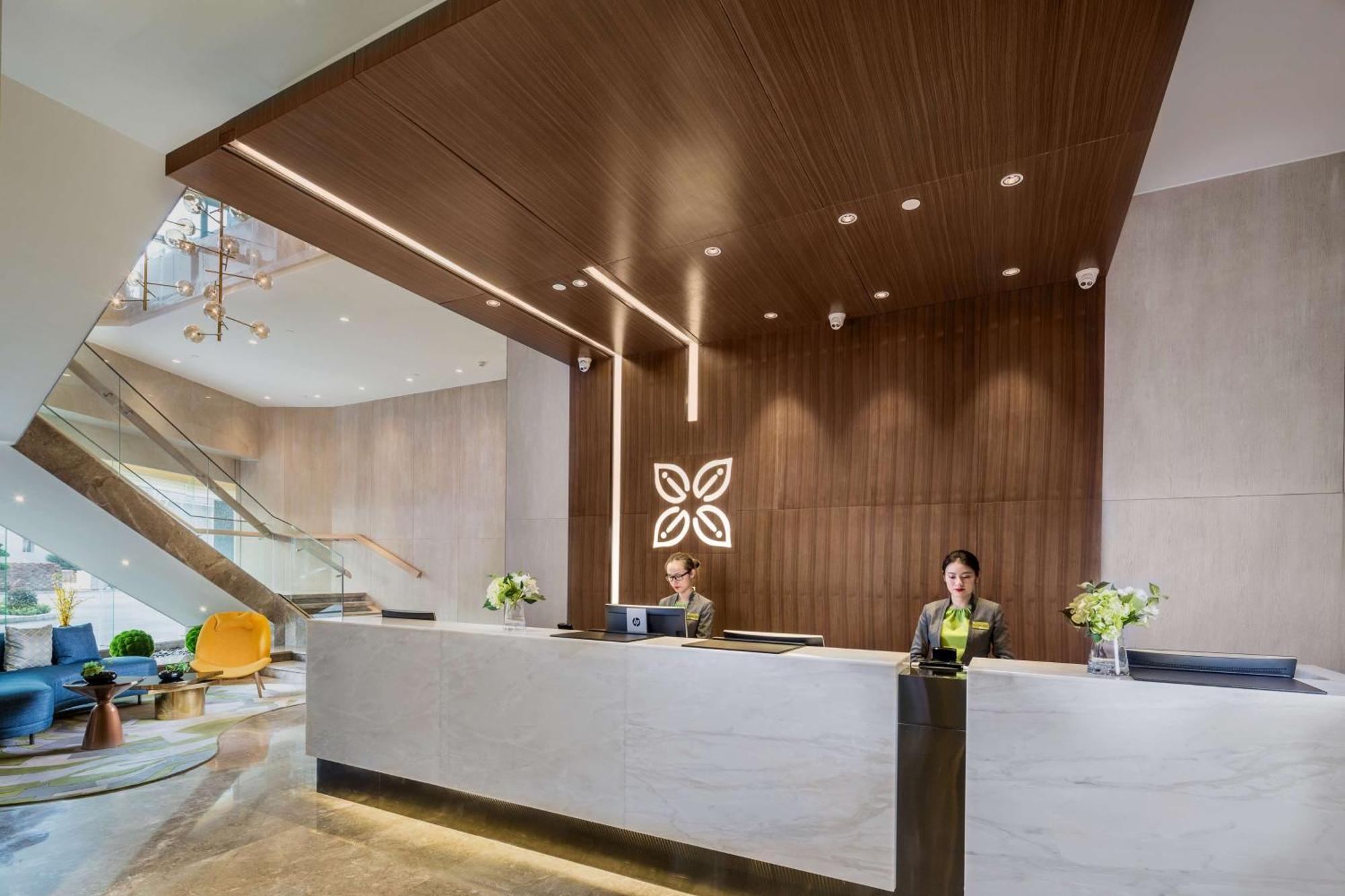 Hilton Garden Inn Zhongshan Guzhen Bagian luar foto